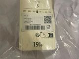 a plastic bag with a label on it that says jfnveter