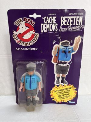 toy figure of a man with a backpack and a backpack on his back