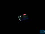 a black background with a red light in the middle of it