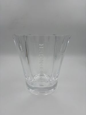 a glass vase that is sitting on a table