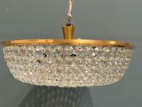 a chandelier hanging from the ceiling in a room