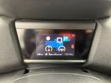 a picture of a car dashboard with a digital display