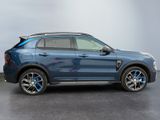 the bmw suv is parked in a room with a gray background