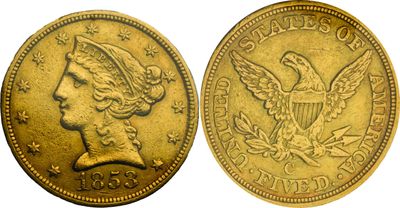a gold coin with an eagle on it