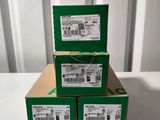 three boxes of green boxes are stacked on top of each other