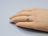 a close up of a person ' s hand with a ring on it