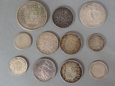 a lot of coins that are sitting on a table