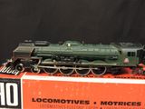 a toy train that is on display on the table