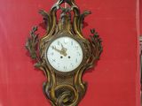 a clock that is on the wall in the room