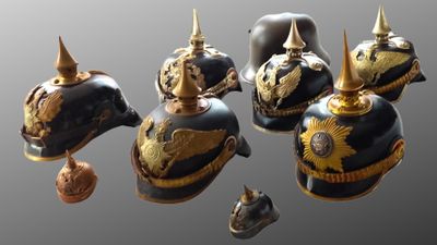 a lot of helmets that are sitting on a table