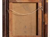 an old picture frame with a rope hanging from it ' s side