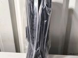a plastic bag with a pair of scissors inside of it