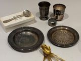 a table with silverware and silverware on it