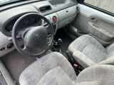 a car with a steering wheel and a dash board in it