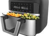 a close up of an air fryer with vegetables in it