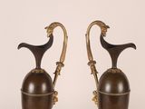 pair of antique brass and bronze vases with handles and handles