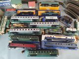 a lot of toy trains that are on the table