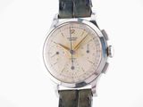 an image of a wrist watch with a leather strap on a white background