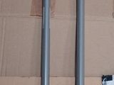 two tools that are sitting on a cardboard box