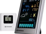 une image représentant une station météo numérique équipée d'une horloge et d'un thermomètre