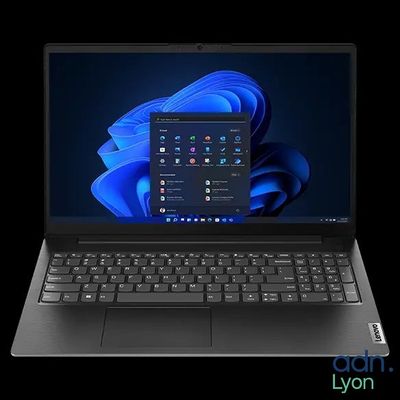 the laptop is open on a black background with a blue background