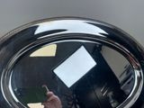 a person taking a picture of themselves in a mirror