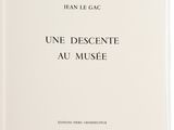 a white book with black writing on the cover