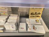 many books that are on display in a case