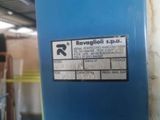 a sign on the side of a blue container