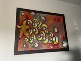 a picture of a painting hanging on the wall