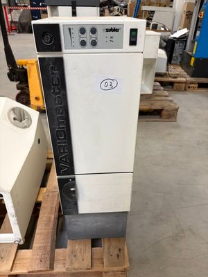 a machine that is sitting on a pallet in a warehouse