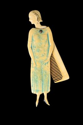 a picture of a woman in a dress and a comb