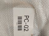 a label on a piece of fabric that says pco