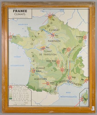 map of france in a wooden frame on a wall