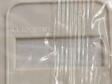 a close up of a plastic bag with a clock on it