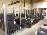 a lot of different types of steel pipes in a warehouse