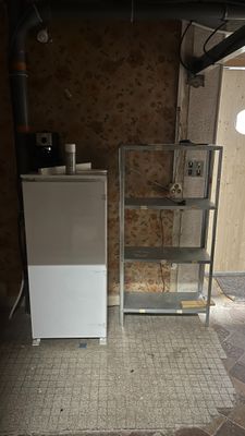 an image of a kitchen with a refrigerator in it