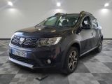 a picture of a grey dacia parked in a garage