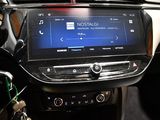 a picture of a car dashboard with a digital display