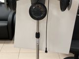 an image of a hair dryer on a stand in a living room