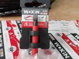 two red and black wires in a package on a table
