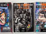 trois livres exposés sur une étagère