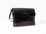leather cross body bag in black with orange and brown details