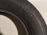 a close up of a tire on a white surface