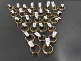 a lot of rings that are on the table