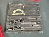 many different tools in the case on the table