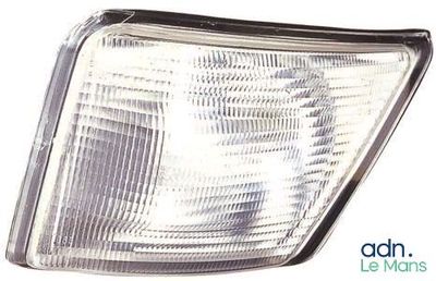 a close up of a headlight of a car on a white background