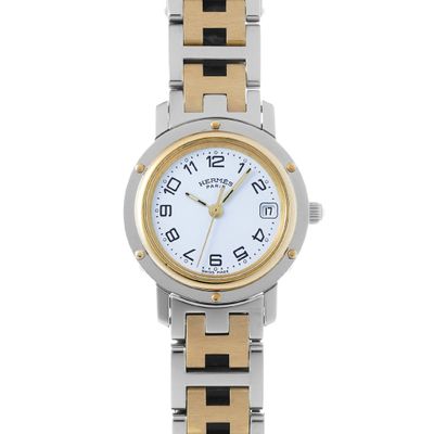 a close up of a wrist watch on a white background