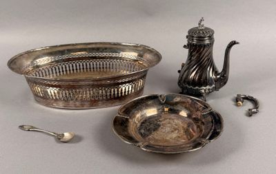 a silver plate with a silver teapot and a silver plate with a silver teapot and a silver plate with a silver teapot and a spoon