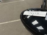 a sticker on the side mirror of a motorcycle